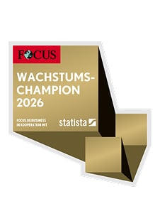 Fokus Wachstumschampion 2026 Award Siegel mit Schriftzug und grafischem Emblem.